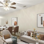 a living room with a ceiling fan